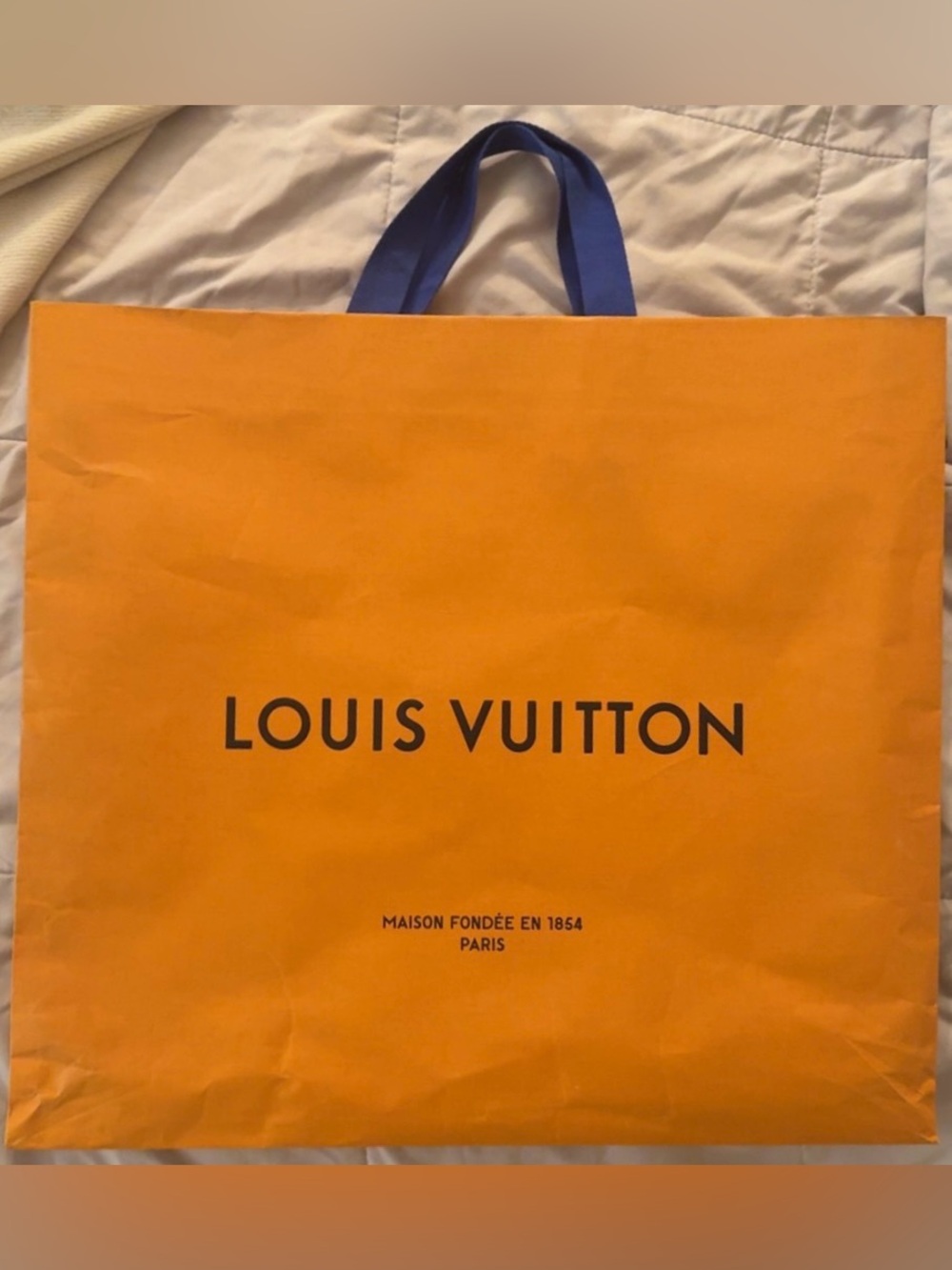 Authentic Louis Vuitton Orange Shopping Bag with Blue Handles